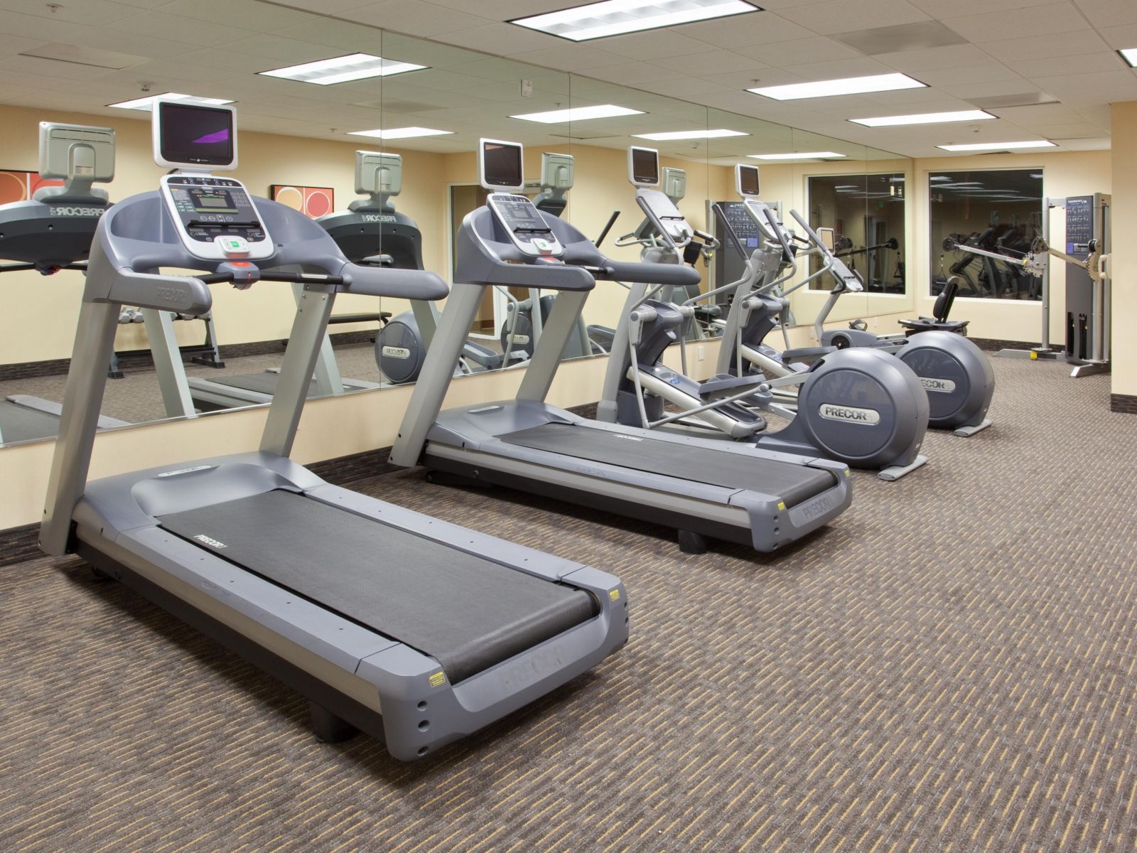 Fitness center at Holiday Inn Express & Suites Oakland-Airport