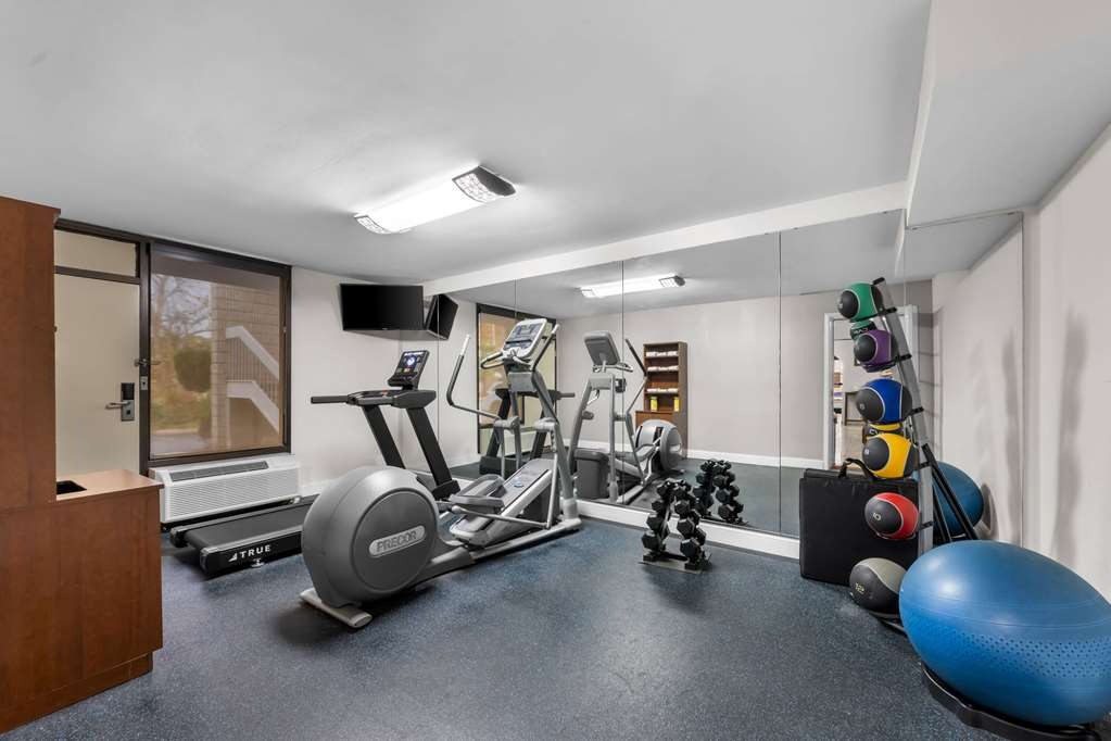 Fitness center at Days Inn by Wyndham Raleigh Midtown